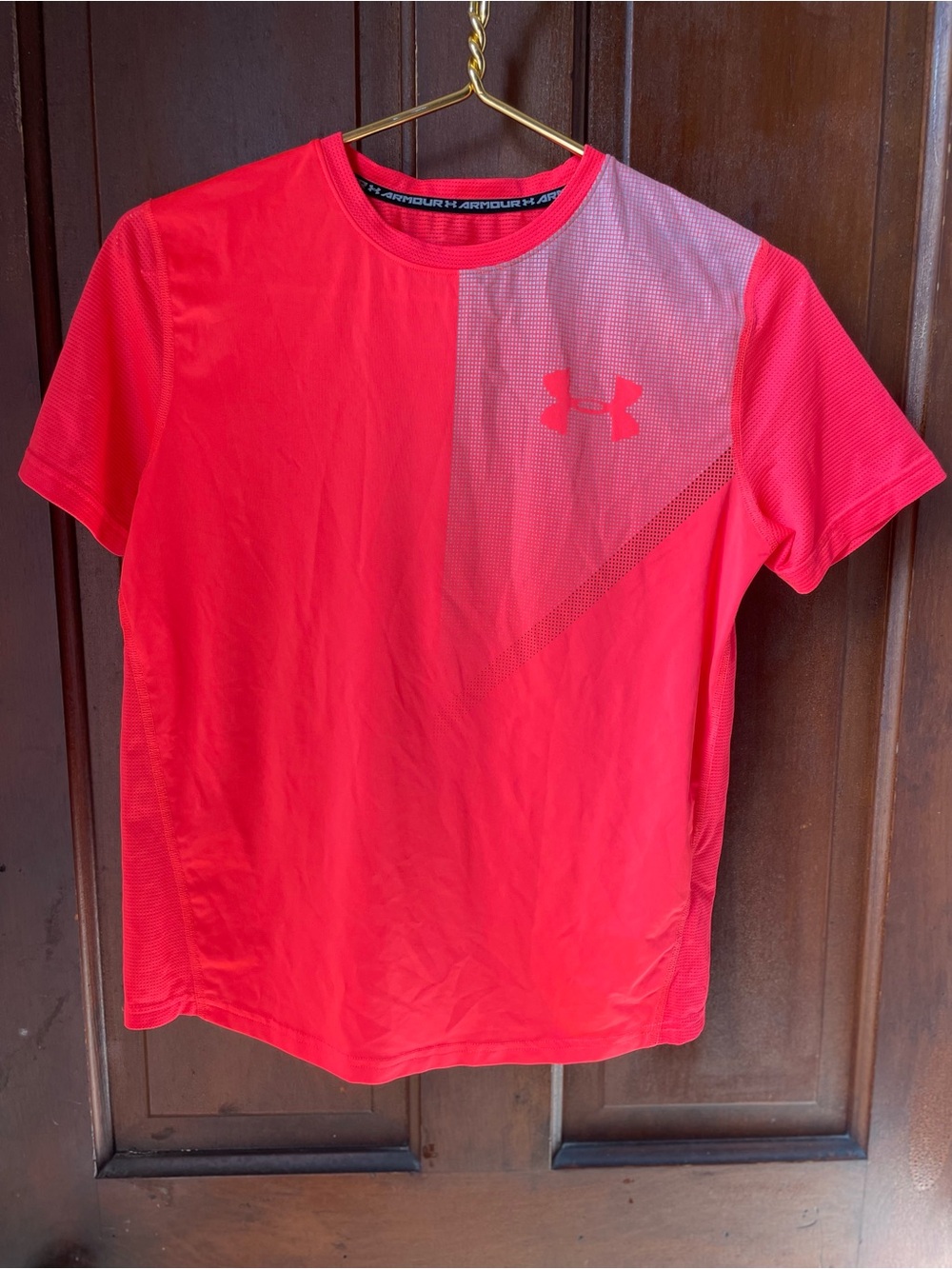 Under Armour boys youth large short sleeve orange athletic shirt
